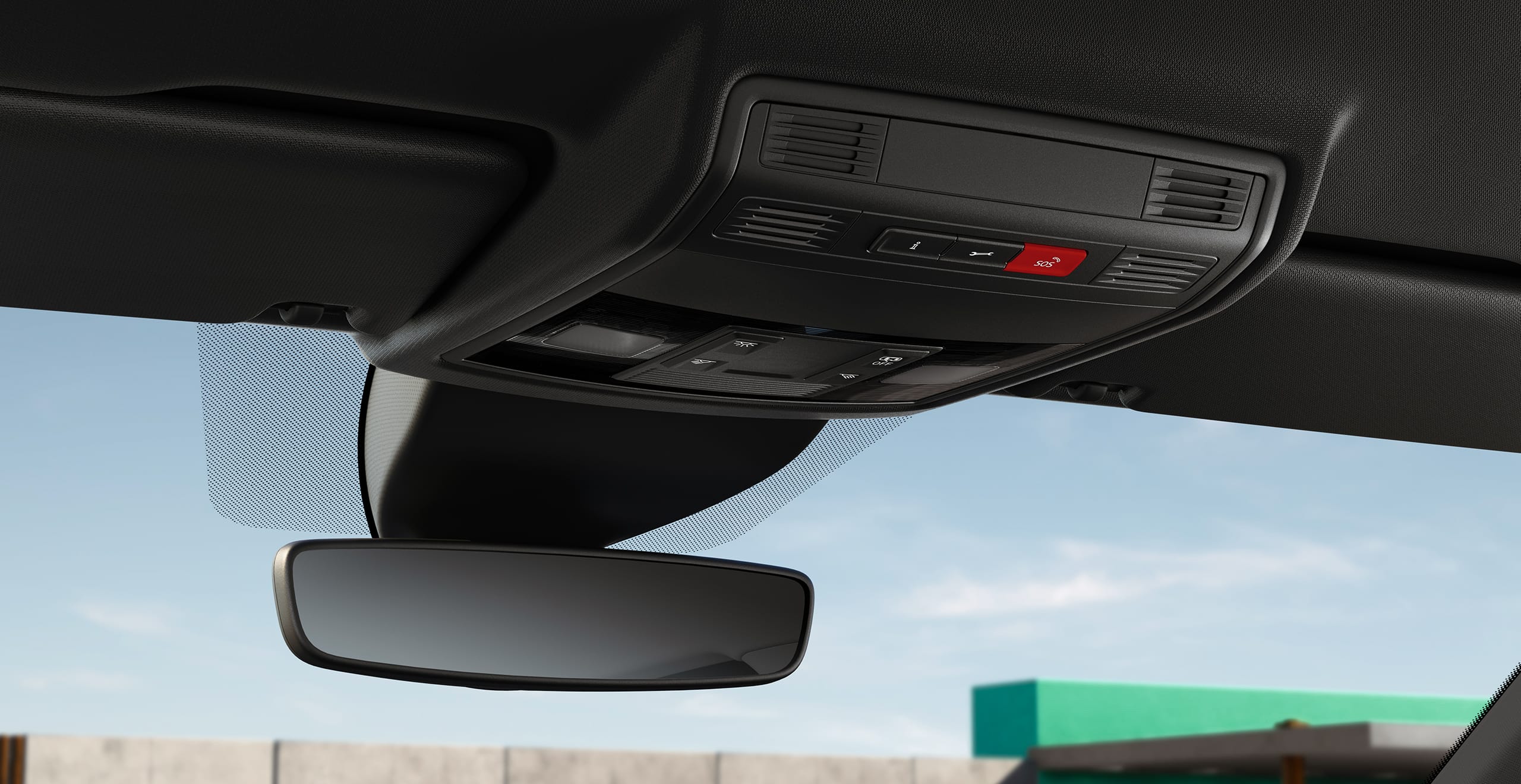 wnętrze SEAT-a Arona z widokiem na wsteczne lusterko