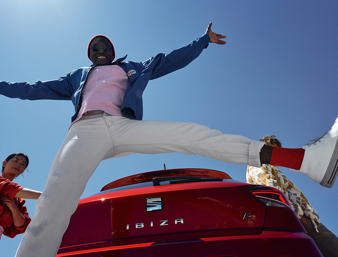 man jumping behind seat ibiza desire red colour fr trim